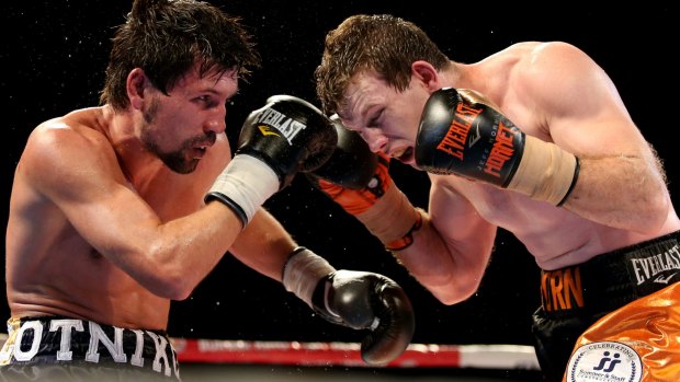 Head down: Jeff Horn (right) has his sights set on going all the way to a world title. 