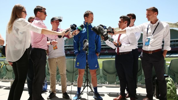 Middle man: Peter Siddle speaks to reporters before a nets session in Adelaide.