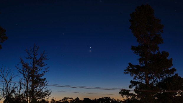 This image, taken in Brisbane in 2016, shows a Jupiter-Venus conjunction, with Venus the lower star in the centre of the image. This year's conjunction will bring the two even closer together in our sky.