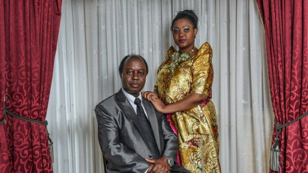 Aggrey Kiyingi, chairman of the Uganda Federal Democratic Organisation, with his wife Mayimuna Nakayiira in their Sydney home.
