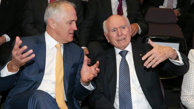 Prime Minister Malcolm Turnbull, left,  with former prime minister John Howard who is up in arms over  Ian Macfarlane's defection to the Nationals.