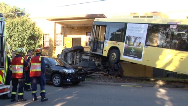 A bus landed on top of a car after it crashed in Northmead in Sydney's west.