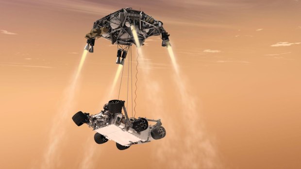  An artist's impression of NASA's Curiosity rover descending to Mars on a sky crane.  