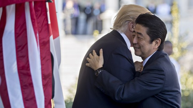 Warm welcome: US President Donald Trump,and Japanese Prime Minister Shinzo Abe.