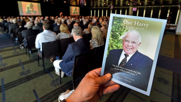 Friends and family attend a memorial to pay tribute to Harry Gordon at the MCG in Melbourne on Thursday.