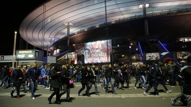 People leave the Stade de France stadium after the international friendly soccer France against Germany on Friday.
