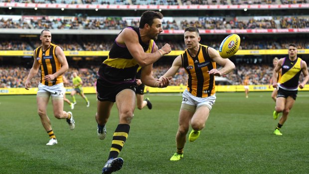 Quick give: Richmond ruckman Toby Nankervis under pressure on the boundary.