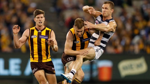 Hawk Sam Mitchell and Joel Selwood engaged in their own personal battle for much of qualifyinig final.