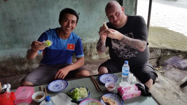 Guide Vien teaches Jamie the fine art of roll-your-own fresh pancakes.