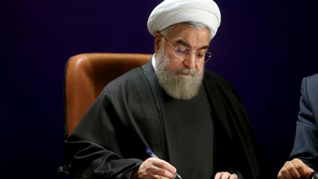 Thanked by his people for the deal: Iranian President Hassan Rouhani in Tehran last week.