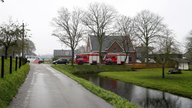 Authorities outside the poultry farm in the village of Hekendorp, where the H5N8 strain was found one day before a case of bird flu was detected in Britain. 