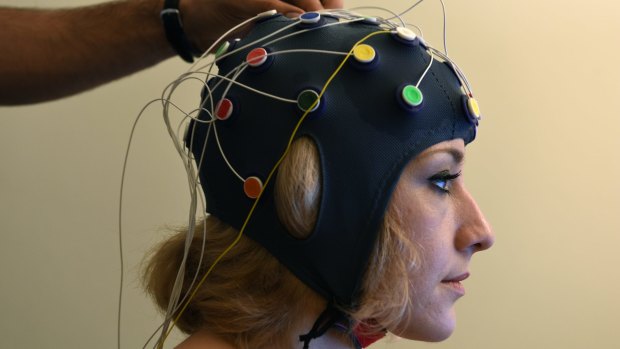 Guinea pig: Amy Corderoy gets hooked up to the transcranial direct current stimulation (tDCS) machine.