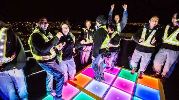 On top of the Bridge, revellers dance on the opening night of Vivid.