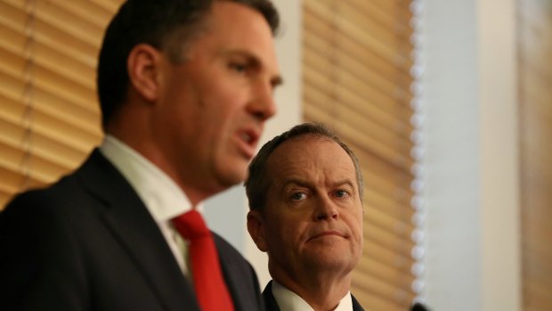 Labor's immigration spokesman Richard Marles and Opposition Leader Bill Shorten address the media on Monday.