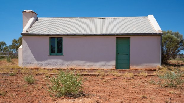 Albert Namatjjra's house is humble, dilapidated, fenced off and neglected.