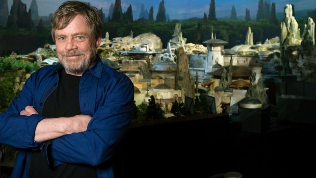 Mark Hamill, from the upcoming film 'Star Wars: The Last Jedi,' was among the first to see a fully detailed model of Disney Parks' new Star Wars-themed land.