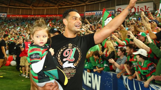 Pinnacle of the game: Souths captain John Sutton after winning last year’s grand final.