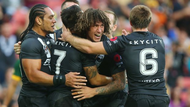 Slice of heaven: The Kiwis celebrate during their Trans-Tasman Test match against the Australia Kangaroos at Suncorp Stadium.
