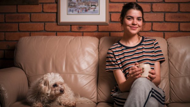 Jeri Packham, seen here with her dog Scruffy, says she was asked to leave her school after she failed a unit of VCE English.