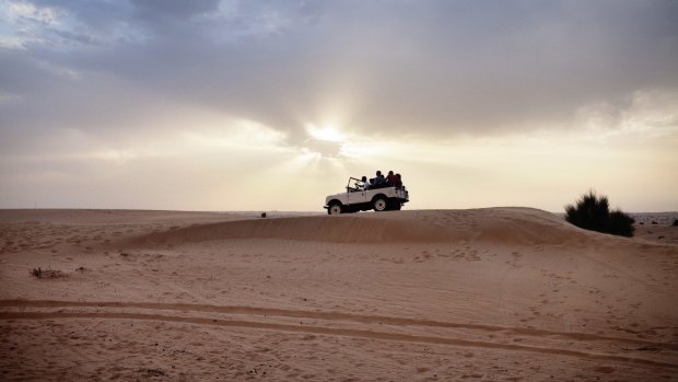 To tackle the dunes with a little more grunt, inside a Toyota LandCruiser.