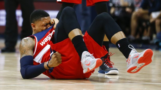 Ouch: Washington Wizards guard Bradley Beal reacts after being injured in the second half against the Atlanta Hawks. Beal returned to the game and Washington won 104-98. 