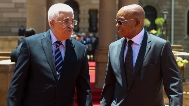 Palestinian Authority President Mahmoud Abbas, left, is received by South African President Jacob Zuma during a state visit to South Africa last week. 