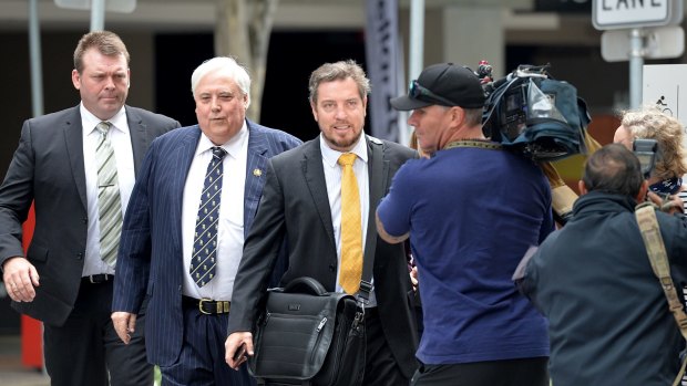 Clive Palmer arrives on Thursday at the Federal Court to answer questions regarding the fall of Queensland Nickel.
