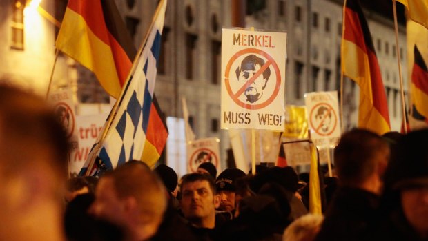 Right-wing groups such as Pegida, seen here marching in the Bavarian capital Munich, have gained traction in Germany after a massive influx of migrants.
