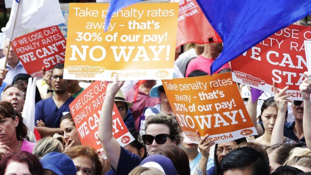 Thousands of workers vented their anger over cuts to penalty rates outside the NSW Parliament on Wednesday.