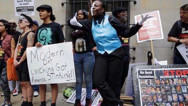 Protesters outside a courthouse after Officer Caesar Goodson was acquitted of Freddie Gray's murder.