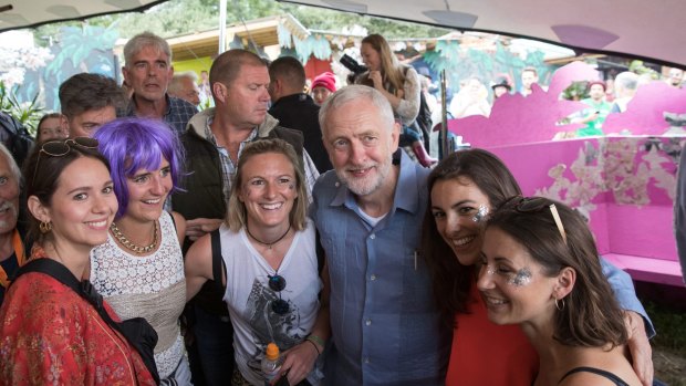UK Labour Party leader Jeremy Corbyn meets Glastonbury Festival goers, near Glastonbury, England, last month.
