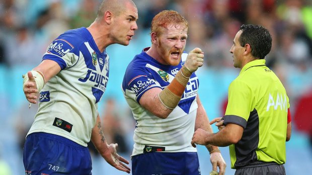 Not happy: James Graham and David Klemmer argue with Gerard Sutton on Good Friday.