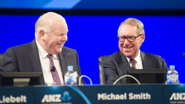 ANZ chief Mike Smith (left) and chairman David Gonski, Mr Smith rejected suggestions Australian bankers were paid too much. 