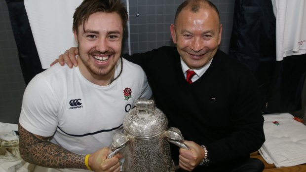Warning: Eddie Jones poses with Jack Nowell after England's Calcutta Cup win.