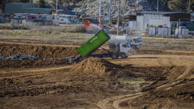 The West Belconnen Fluffy dumping site receives an average 38 truck and skip loads of demolition material a day. 