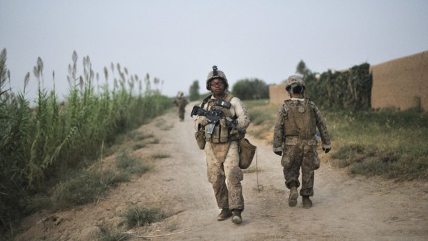 Corporal Christina Oliver of the 6th Marine Regiment on counter-insurgency patrol near Sistani, Afghanistan, in 2010.