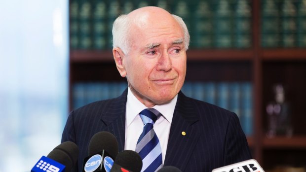 Former prime minister John Howard gives a press conference on the passing of Richie Benaud on Friday morning.