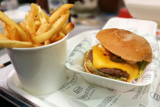 Coburger & Co's 'Lip Popper' wagyu burger with battered jalapeno, cheese, lettuce, tomato, pickles, chipotle mayo and guacamole.