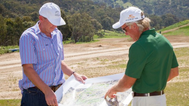 David Evans at Cathedral Lodge Golf Club with its designer, golfing legend Greg Norman.