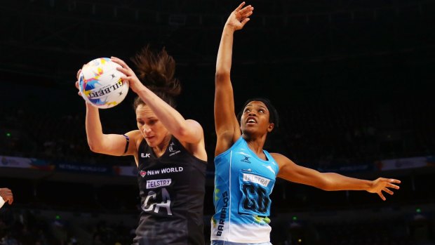 My ball: Brown of New Zealand is challenged by Shanice Rock of Barbados.