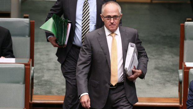 Communications Minister Malcolm Turnbull arrives for Question Time on Monday.