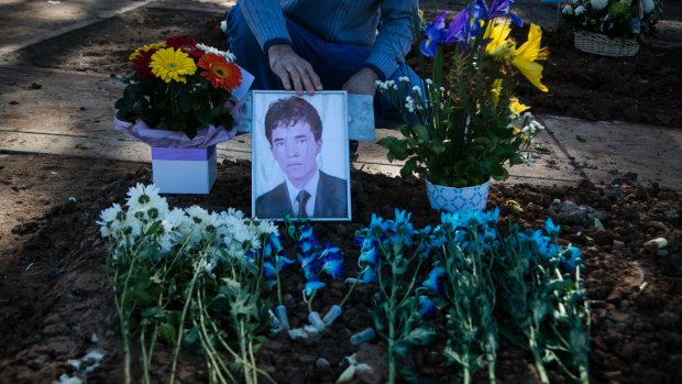 At the grave of Hazara asylum seeker Mohammad Hadi,  one of a spate of suicides among Afghanistan Hazara asylum seekers in Australia. 