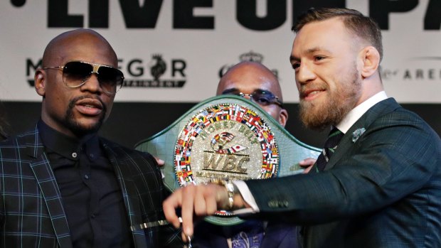 Floyd Mayweather, left, and Conor McGregor at a news conference in Las Vegas on Wednesday.