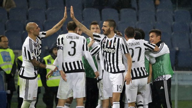 Juventus players celebrate Stephan Lichtsteiner's goal.