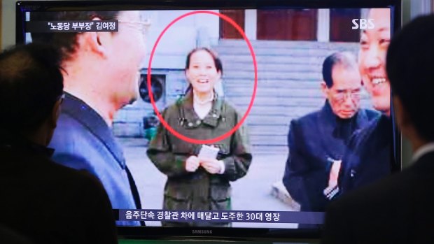 South Koreans watch a TV news program showing Kim Yo-yong, the younger sister of Kim Jong-un.