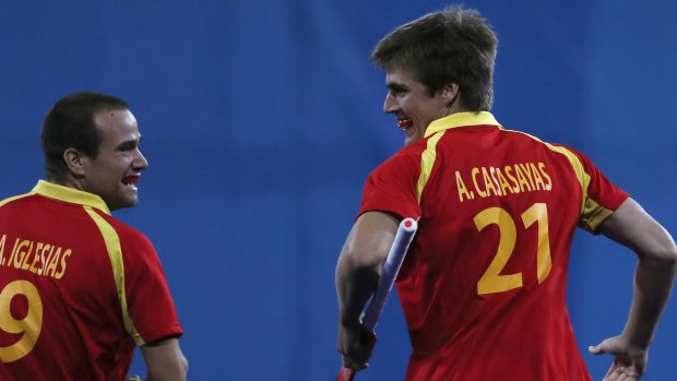Goal hero: Spain's Alex Casasayas, right, smiles with teammate Alvaro Iglesias.