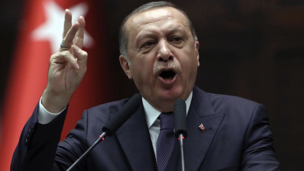 Turkish President Recep Tayyip Erdogan addresses his supporters in Ankara on Tuesday.