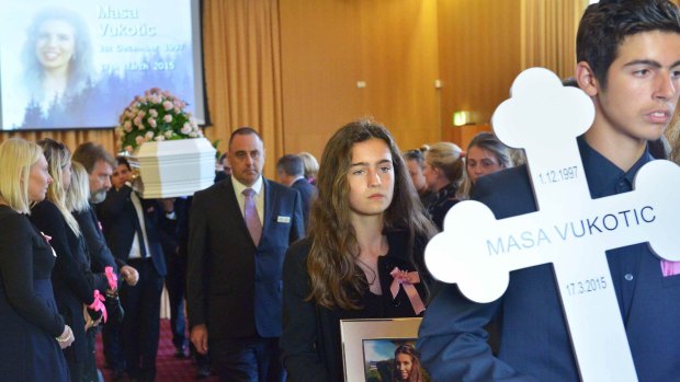 Masa Vukotic's brother Petar and sister Nadja at the teen's funeral.