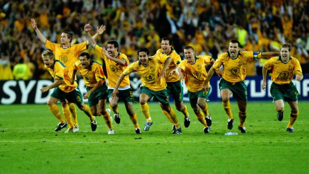 Oh what a night: the Socceroos celebrate after John Aloisi's famous penalty kicked them into a first World Cup in 32 years.