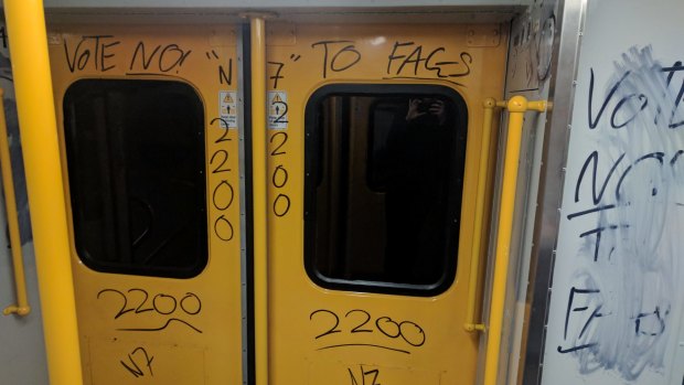 A train vandalised in Sydney with "vote no" graffiti.